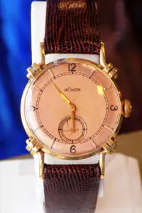 A watch is shown with the time displayed.