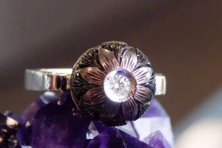 A close up of the flower on a ring