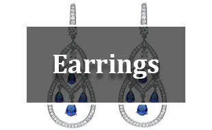 A pair of earrings with blue stones and white diamonds.