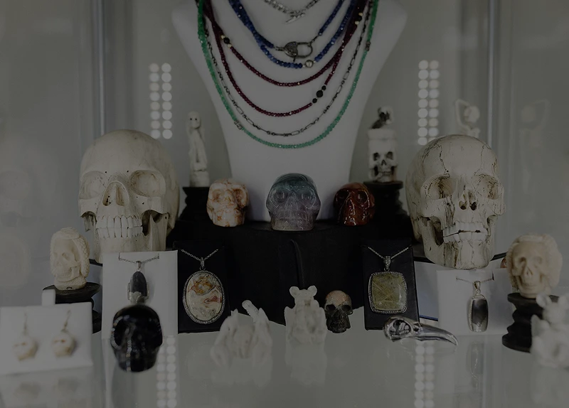 Assorted skulls and pendants on display